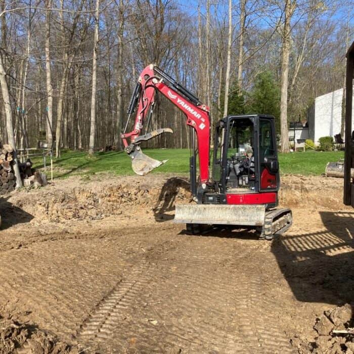 Excavator preparing ground for construction