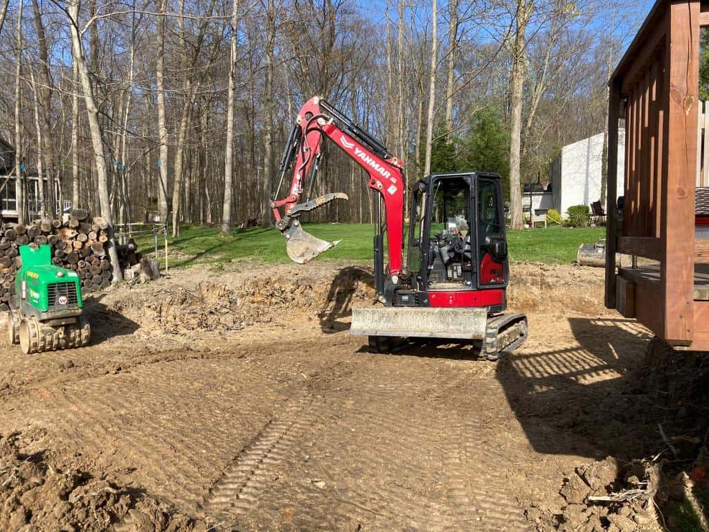 Excavator preparing ground for construction
