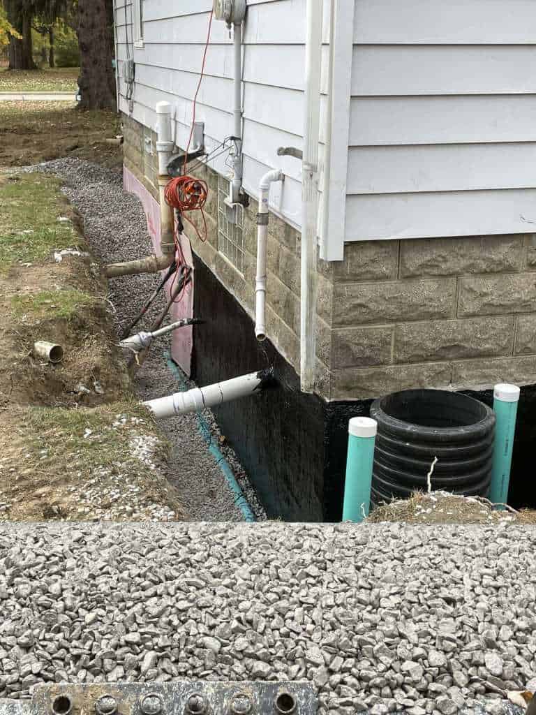 Construction site with drainage pipes visible
