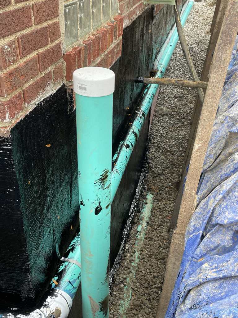 Pipes and waterproofing materials in trench