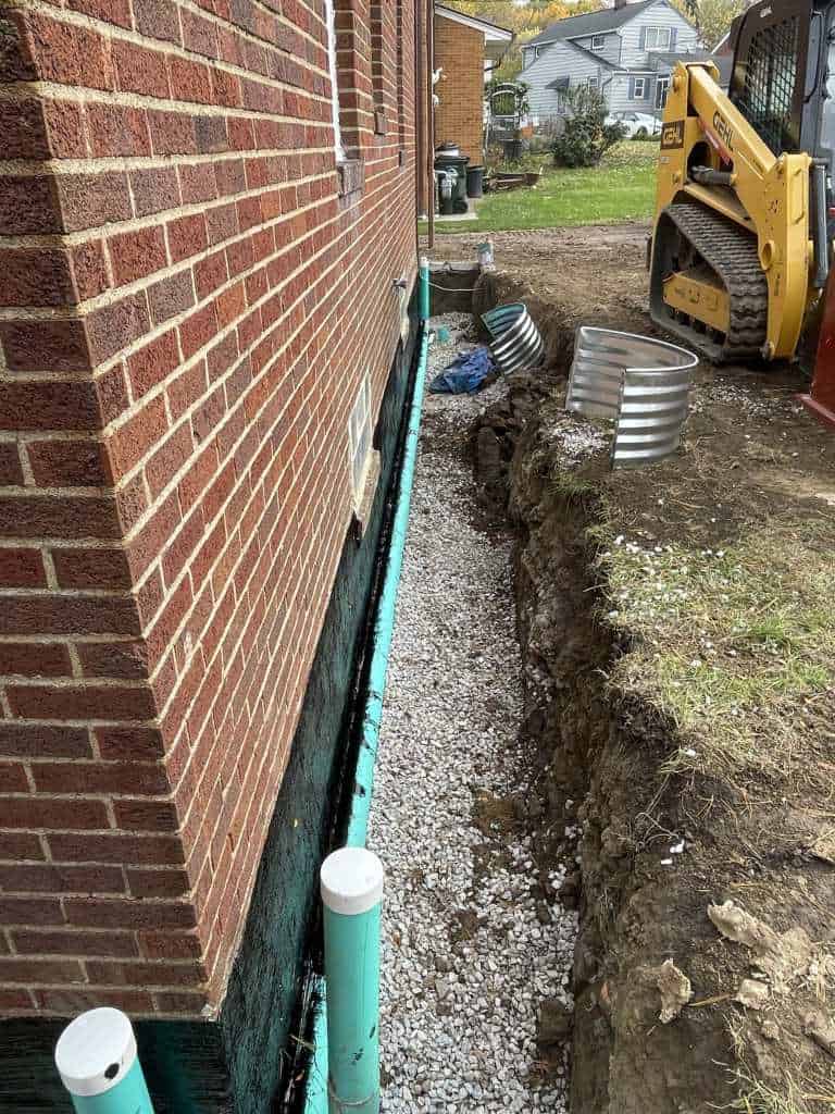 Excavated area for basement waterproofing