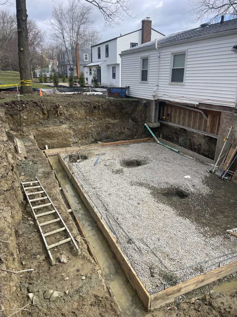 Excavated area for foundation construction.