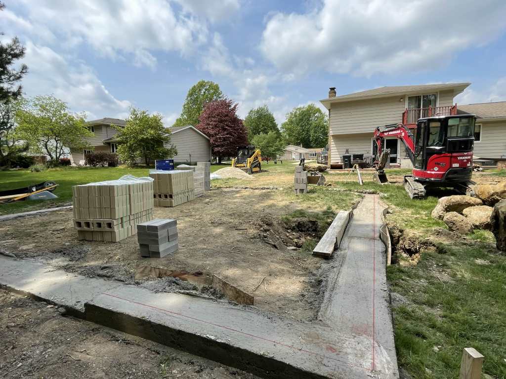 Construction site with materials and machinery
