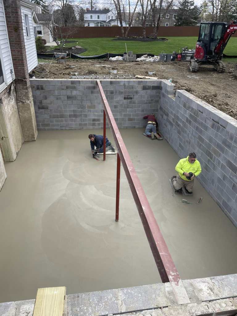 Construction workers in a foundation site.